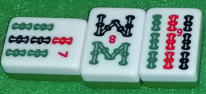 A straight meld called using Chi. The tiles are, from left to right, the called 7-Sou, 8-Sou, and 9-Sou.