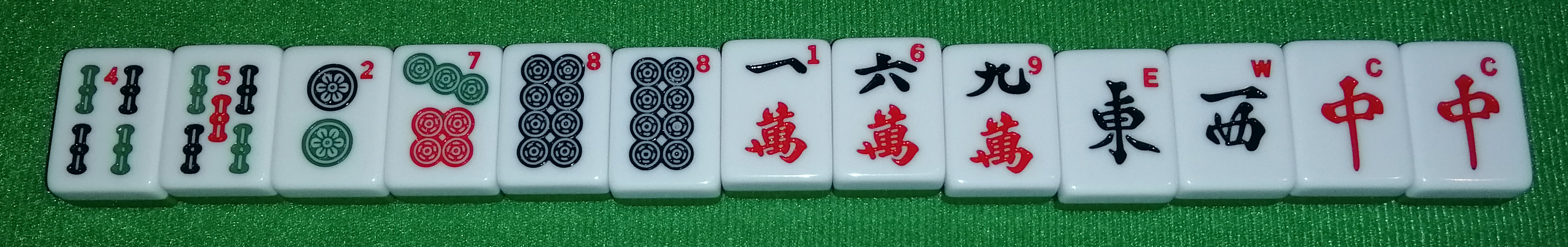 A potential hand. From left to right: 4-Sou, 5-Sou, 2-Pin, 7-Pin, 8-Pin, 8-Pin, 1-Wan,
						6-Wan, 9-Wan, Ton, Sha, Chun, Chun.